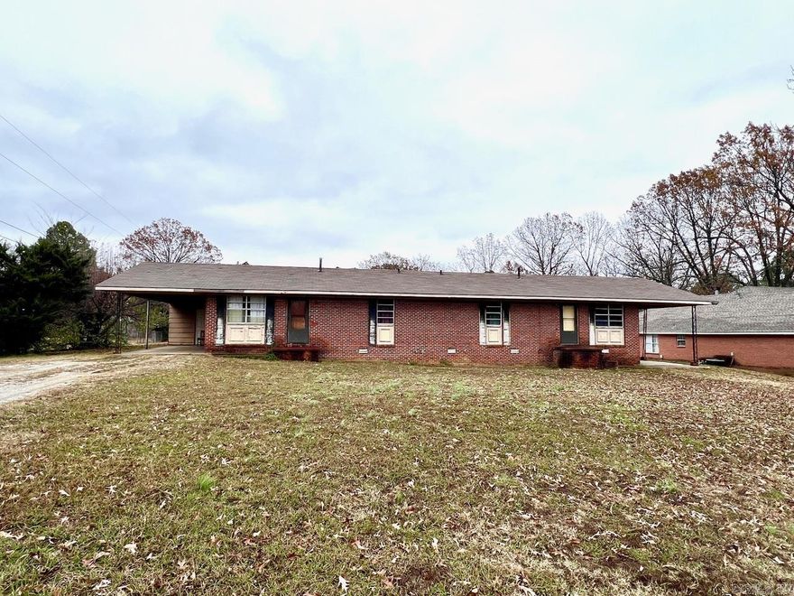 This all-brick duplex in the sought-after Sunset Hills Subdivision is ready for its next chapter. Sitting on a generous 0.43-acre lot, each unit features 3 bedrooms, 1 bathroom, and a single-car carport. Both sides are currently vacant, offering a clean slate for your next value-add project. Whether you're an experienced investor or just getting started, this property is perfect for renovation and strong future cash flow. Located just minutes from the Hilltop area's top amenities and a short drive to Arkansas State University, the location makes tenant attraction easy. Schedule your showing and unlock the upside potential today!