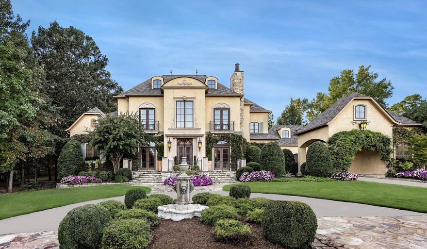 Behind the gates of prestigious Sologne Circle in Chenal Valley, this stunning French Country estate offers luxury and charm at every turn. A grand 2-story entry with double antique doors and stone floors sets the tone for the craftsmanship throughout. The chef’s kitchen features top-of-the-line appliances, paneled refrigerator, copper sink, ice maker, walk-in pantry, wine room, and butler’s pantry, opening to vaulted living spaces overlooking the pool. The primary suite is a private retreat, plus a library, office, formal living room, and craft room complete the main level. Upstairs offers 4 en-suite bedrooms and a game room, with a theatre room on the 3rd floor. Outside, enjoy a circle drive, covered porch, outdoor kitchen, and large play area. A rare opportunity in one of Chenal Valley’s most coveted neighborhoods—schedule your private tour today!