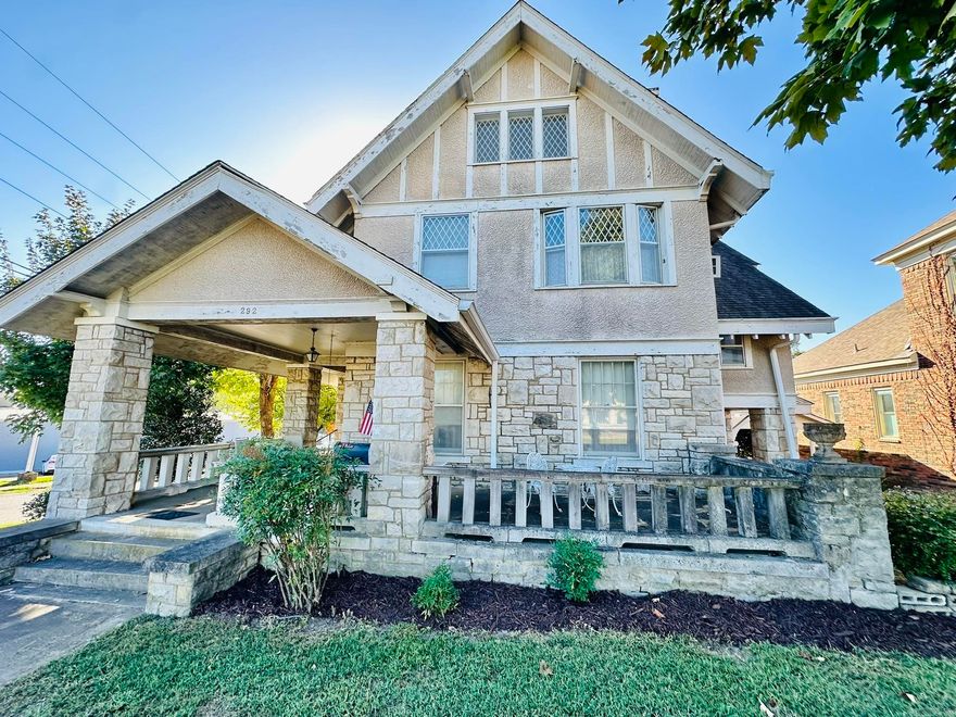 Exceptionally charming home listed on the National Historic Register!  The Adler House was built in 1915 and lovingly preserved with its original character and architectural details.  This four-bedroom, 2.5 bath residence sits on a prominent corner lot an doffers a rare blend of history and potential.  Behind the main house is a detached carriage house that could be restored as an appointment or mother-in-law quarters (buyer verity permits).  Being sold as-is.  Circa 1915; listed on the National Register of Historic Places.  Detached carriage house with strong rental or ADU potential ideal for restoration.  Corner lot with mature landscaping and curb appeal.  The craftsmen style home retains original trim, millwork, moldings, possibly original flooring, built-in features and other period details (buyer to verify).  Historic condition; renovations and updates anticipated.  Historic Rehabilitation Tax Credit may be available buyer should contact appropriate historic preservation offices/tax advisors to confirm eligibility and details.