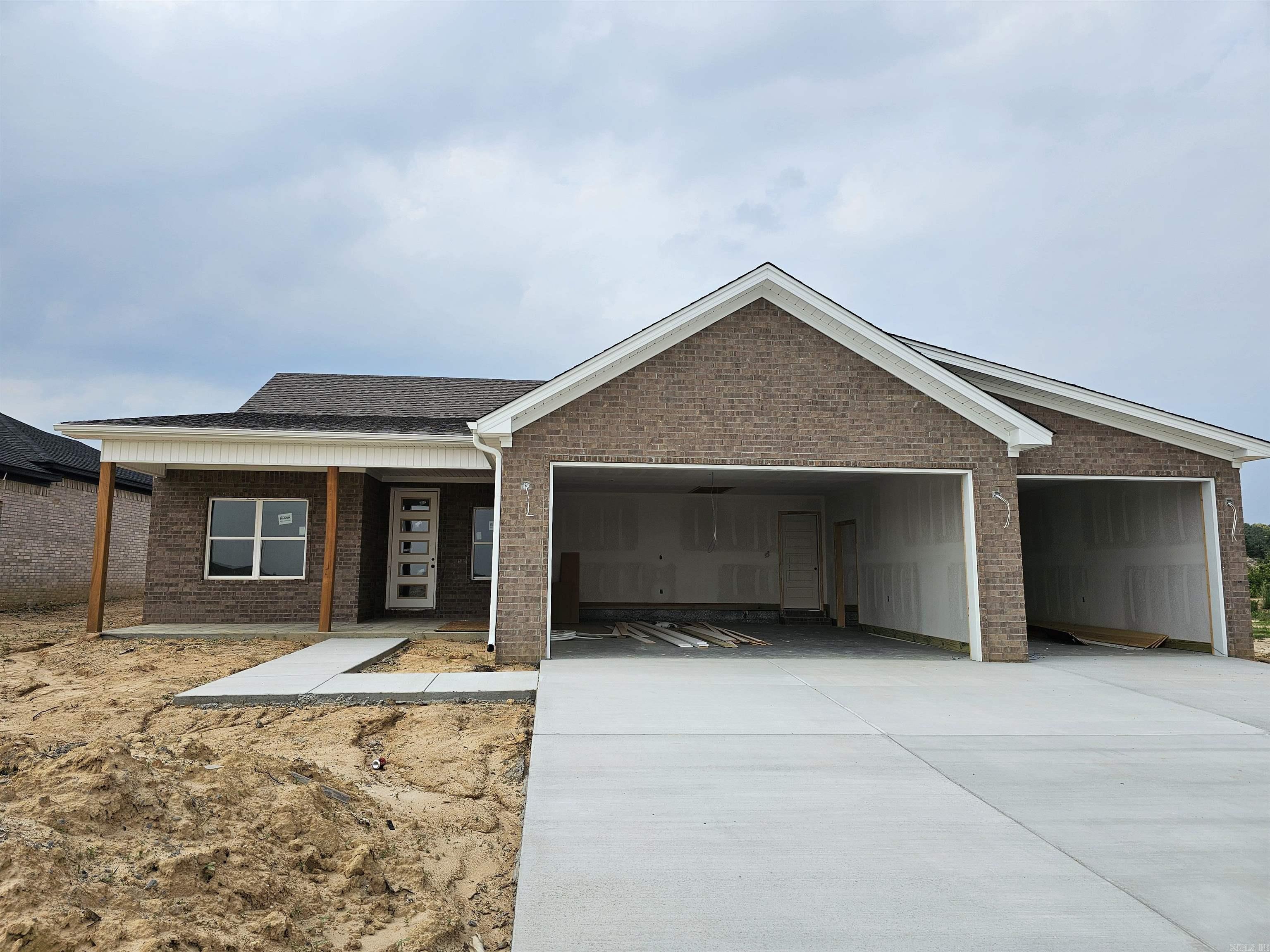 This beautiful new 3 Bedroom, 2 Bathroom home spans 1952 sq.ft. of thoughtfully planned living space. Situated in a sought-after neighborhood, this home offers a dedicated office, a spacious 3 car garage, a fully brick exterior, and foam encapsulated insulation to increase energy efficiency for year-round comfort. Located less than a half mile from Sheridan Middle School and Hope Valley Plaza you’ll enjoy the perfect mix of community amenities and accessibility to shopping, dining, and education. This home is 1 months until complete.