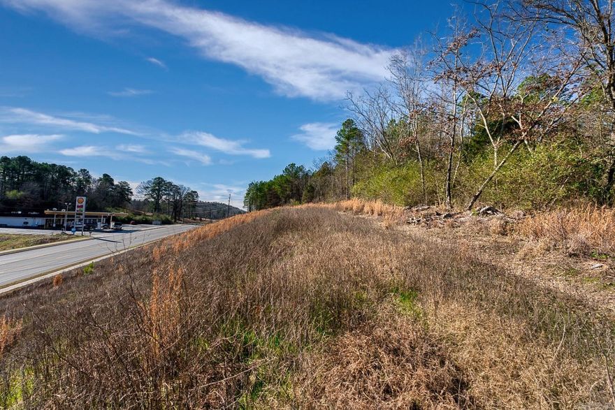 Busy highway frontage seeks Commercial Development! This mostly flat with Utilities C-4 Zoned, city acreage is primed and ready for almost any new business. Lots of visibility and high traffic counts at this location. Topo and many other docs available for this property.