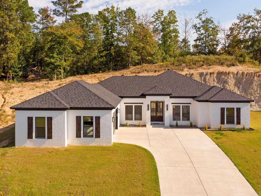 Brand new 2025 construction in Benton! This modern home (the Largest house plan in the neighborhood) on Hampton Drive features an open floor plan, stylish kitchen with granite countertops, luxury finishes, and energy-efficient design. Enjoy a spacious living area, two-car garage, and landscaped yard. Located in a quiet neighborhood close to shopping, and dining - the perfect blend of comfort, quality, and convenience.