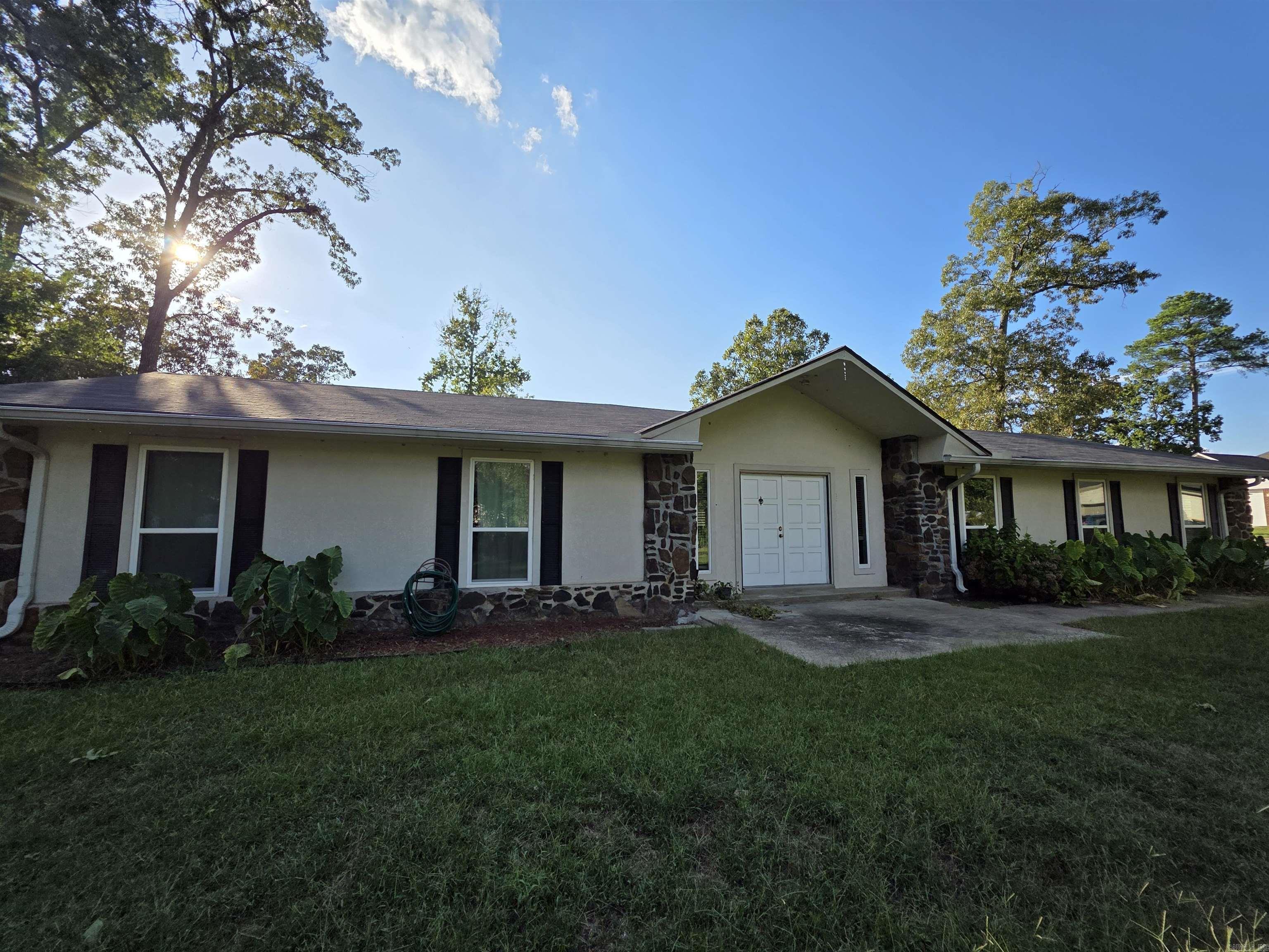 This is a unique opportunity in White Hall to have right at an acre of land and a shop building in the city limits of White Hall. Located on a dead end street limits traffic as well. This home is in move in condition with recent updates and has a bonus den that could be used for entertaining or a large family room. Don't miss this one! Call me to take a look! See agent remarks.