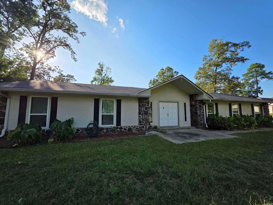 This is a unique opportunity in White Hall to have right at an acre of land and a shop building in the city limits of White Hall.  Located on a dead end street limits traffic as well. This home is in move in condition with recent updates and has a bonus den that could be used for entertaining or a large family room.  Don't miss this one! Call me to take a look! See agent remarks.