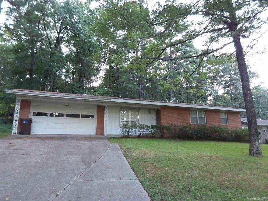 Very well cared for, one owner home! Kitchen updated with custom cabinets and Maytag black appliances. Two separate living areas. All bedrooms are nice size. Ample storage and closet space throughout. Hardwood floors under the carpet and some hardwood already exposed. Extra large, tree shaded lot with lake views from the front porch or walk across the street and enjoy the private lake for fishing, picnics, walking etc. Two car garage has a workshop, work area as well. Great home that offers much!