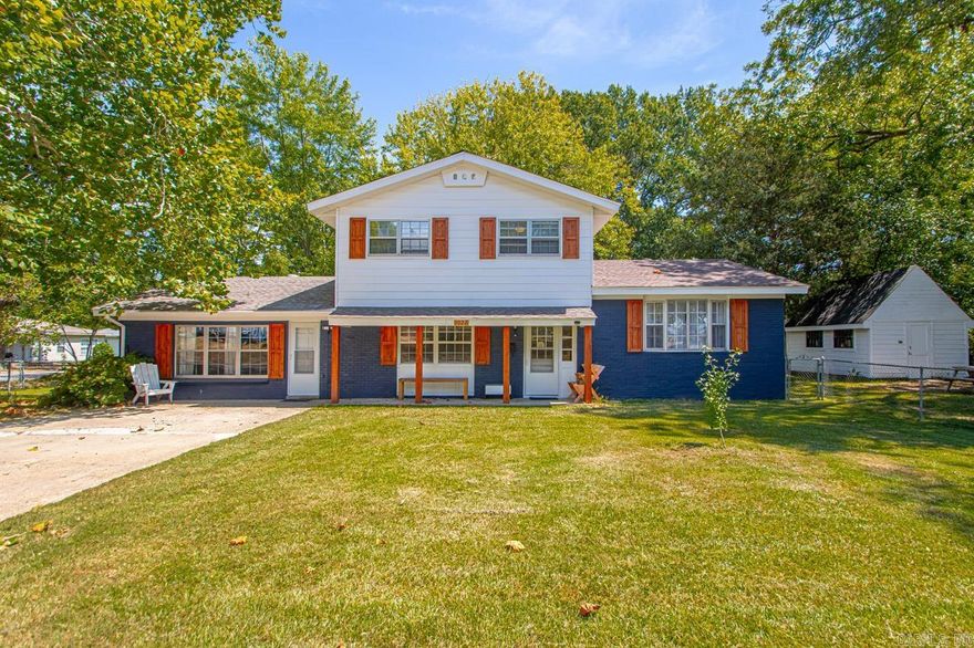 This home sits on a large corner lot and is within walking distance of Ida Burns elementary, Conway Junior High, and Conway, Laurel & Veteran’s park, & the Tennis Center. 5 minutes from UCA and Conway Regional. Large back yard is entirely fenced with double gates on two sides. 12 x 16 shop with a loft and roof that is 5 yrs old. Roof on house is 5 yrs old. 12 x 16 deck on back of the house. New outdoor paint and 3 storm doors. Two living areas, one with new LVP flooring, could also include a formal dining area. Second is a large den with lots of possibilities. Kitchen is large enough for a breakfast nook and counters recently resurfaced. Garbage disposal and cooktop less than a year old. Dishwasher is less than 5 years old. Ground floor also includes a half-bath and utility, which could double as a pantry or home office. The large converted garage ($1,000 flooring allowance) could be a playroom, office, home gym, music room, or third living area. New 5-ton HVAC unit, water heater and LED lighting downstairs and in the upstairs bathrooms. New carpet on stairs and upper landing. Upper level with 3 bedrooms, hardwood floors, 2 baths. New vanity in guest bath & ceiling fan in all rooms