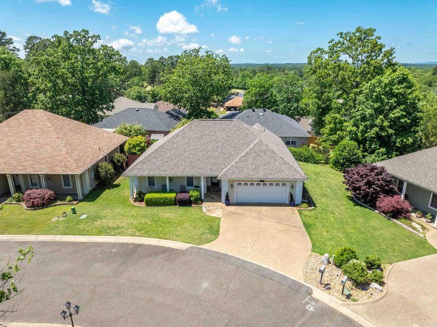 Discover the charm of 124 Garden View Circle! Tucked away in a quiet enclave of just seven homes, this beautifully maintained retreat offers the perfect blend of comfort, style, and privacy. Step inside to an inviting open split-bedroom floor plan—ideal for both entertaining and everyday living. The kitchen features marble countertops and sleek stainless steel appliances that make cooking a joy. The spacious primary suite is your personal sanctuary, complete with a luxurious ensuite bath, walk-in shower, jetted tub, double vanity, and generous walk-in closet. Unwind in the enclosed sun porch—your own peaceful haven perfect for morning coffee, evening wine, or hosting friends in every season. The beautifully landscaped yard adds to the home’s curb appeal, and with a full sprinkler system, maintaining a lush, green lawn is effortless. Don’t miss your chance to call this serene, sought-after neighborhood home. Seller is offering a $10,000 flooring allowance. Schedule your private tour today!