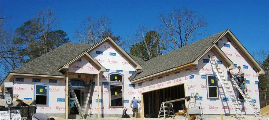 Side load garage, extra landscaping. 12 ft ceilings, formal dining,hardwoods in main living areas, granite in all wet areas. Tile in all wet areas. Custom stained cabinets in kitchen, painted cabinets in bathrooms. Large master with tile shower and large walk in closet.