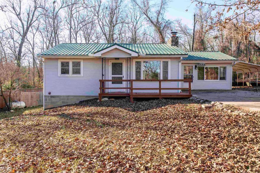 Ozark cottage for sale in Williford, Arkansas  Located in the desirable **Ozark Acres planned development**. This well-maintained **2-bedroom, 1-bath home** offers **1,222 sq ft of heated and cooled living space**, plus a flexible **bonus room** perfect for an office, craft area, or additional sleeping space.  Recent updates include **new carpet**, **fresh interior paint**, **updated light fixtures**, and a **new stove and refrigerator**—giving the home a crisp, move-in-ready feel. The **crawl space is fully encapsulated with a vapor barrier**, adding long-term efficiency and protection. Step outside to enjoy a peaceful yard featuring a **beautiful Jane Magnolia**, a **dogwood tree**, and **mature oak shade trees** that frame the property with classic Ozark character. The **covered back deck** offers a relaxing spot for morning coffee, grilling, or watching wildlife. Additional outside storage, provides space for tools, lake gear, or seasonal items.  As part of Ozark Acres, property owners enjoy access to two private lakes ideal for fishing, kayaking, and canoeing, along with the quiet natural beauty the Ozark Mountains are known for.