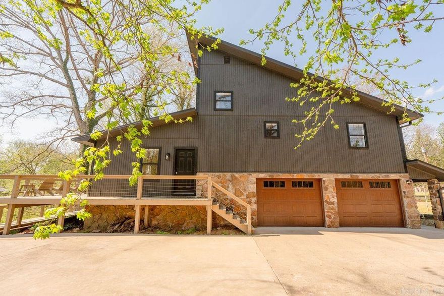 Completely renovated RIVERFRONT home on the LITTLE RED RIVER with its own private dock! This 1,920 sq ft, 3 bedroom, 2 bath split-level home features a side-entry oversized 2-car garage and offers the perfect setup for full-time living or a successful Airbnb. Recent updates include a brand new deck and dock with boat slip, new garage doors, fresh interior & exterior paint, landscaping and a new metal roof to be installed. The home features a beautiful new wood ceiling in the living room, remodeled bathrooms, all new appliances, new quartz countertops and new LVP flooring and window blinds throughout. Enjoy peaceful river views and move-in ready convenience in this thoughtfully updated property. Convenient to multiple Little Red River boat launch areas and walk-in access. Greers Ferry Lake is a short 20 minute drive. Contact your agent for a showing today!