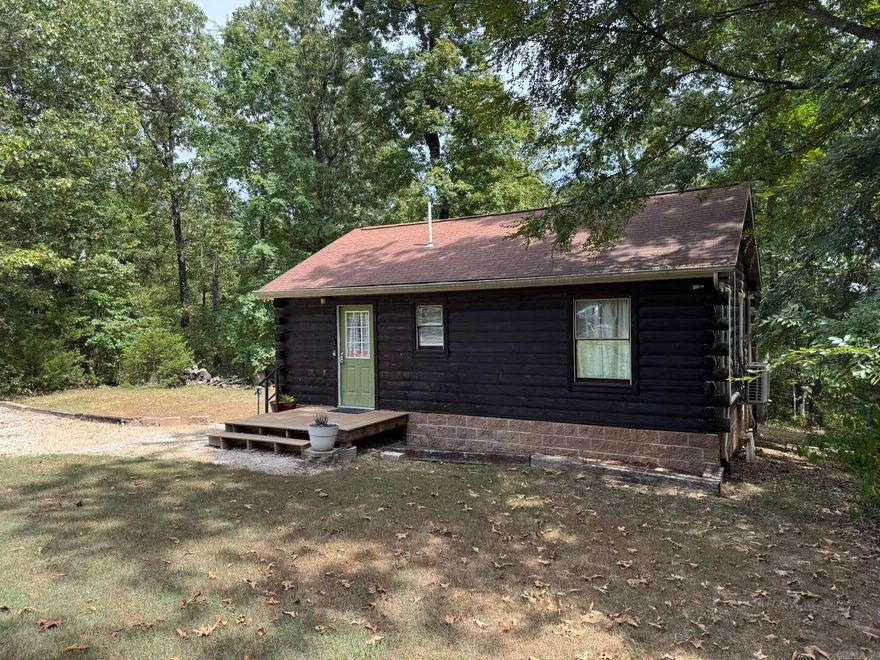 You will be amazed at the craftsmanship put into this recently updated Cabin located on a level 3.43 ac/ml wooded lot, not far from Lake Norfork Access. Inside you will find a well-designed open feel living space, with real wood features like the tongue & groove ceilings, & walls. Real wood cabinets in the kitchen, with modern appliances. The bathroom features a stackable washer & dryer, plus all the appliances & furniture can convey with an acceptable offer. Outside you will find a large deck & spacious fire pit area to enjoy while you soak up nature’s beauty. The home sits back off the county road for your privacy. Come take a tour.