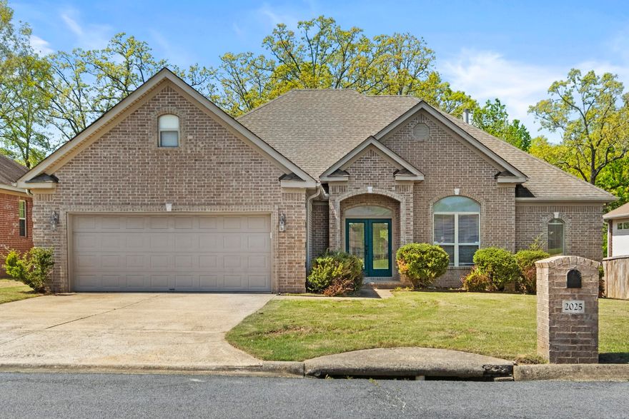 This home has a fresh new look with new paint throughout and new luxury vinyl plank flooring in the living area, bedrooms, and bathrooms. You will love the open floor plan for family gatherings! The fireplace with gas logs, anchors the large living area. The kitchen is complete with stainless appliances and a bonus - the refrigerator stays! The primary bedroom is spacious and just wait until you see the closet. Wow! So much space and designated shoe shelving! The ensuite bath also has a separate shower, whirlpool tub and double sinks. Opposite the primary suite are 3 guest bedroom which share a hall bath. Rounding out the interior is a laundry room with hanging and folding space. The washer and dryer will stay. Outside, enjoy the private covered deck and level yard. Agents, see remarks.