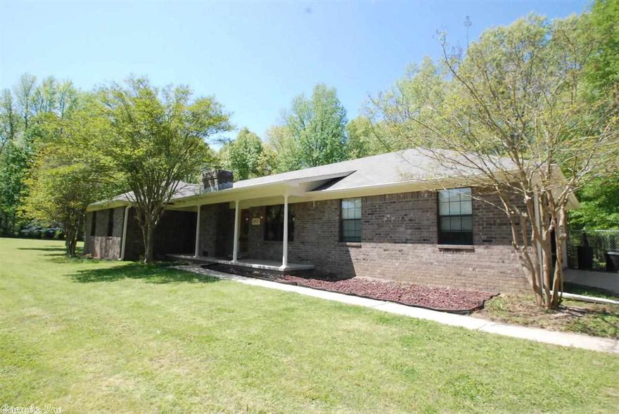 Quiet country living! New roof, new hot water heater, HVAC heat pump w/ 16 SEER 2 yrs. Open living room which dining and kitchen are open to.  Hardwoods in living, dining, master bedroom.  Tray ceiling in living area with WBFP. Pantry in kitchen. Big tub in master. Sun room opens onto deck.  Fully fenced backyard for pets. Acreage goes back beyond fenced area. 16x24 Storage shed. 2 car garage with lots of storage. Septic system. Satellite. Please give 1 hour notice for showing to remove pets.