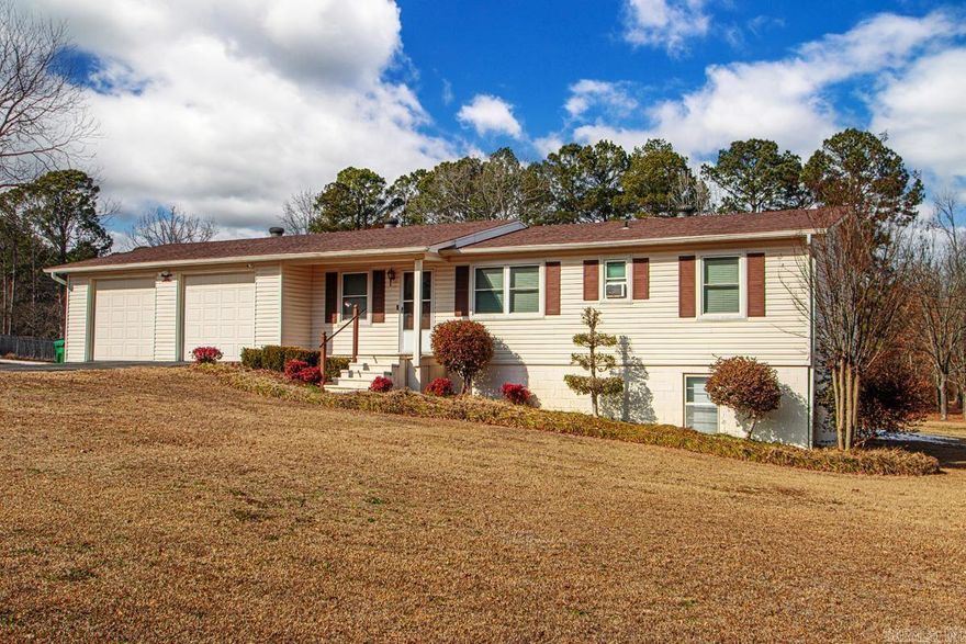 This fantastic property is an ideal choice for a first-time homebuyer. Well-maintained by only two owners, the home features numerous updates from the past five years and a roof estimated to be approximately 10 years old. The 3-bedroom, 1.5-bath residence sits on approximately 1.61 mostly fenced acres. Interior highlights include a beautifully updated kitchen, while the exterior offers an oversized two-car garage for ample storage. You can also enjoy quiet evenings and outdoor cooking on the spacious screened-in back porch. The home is built on a pier and beam foundation. The basement features high ceilings and well-maintained systems, offering an additional unconditioned space perfect for a workshop or extra storage. A storage building in the backyard is also included with the property. This home will not last long—contact me today to ensure you don't miss out.