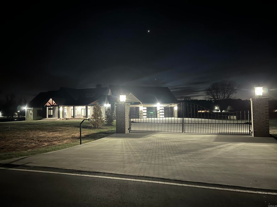 SPECTACULAR ARCHITECTURE WITH IMPECCABLE DESIGN AND QUALITY. Custom built home, open floor plan, upscale chef's kitchen with two large islands w/working station, Jenn-Aire stainless steel appliances including 6 burner gas stove, quartz countertops, porcelain tile flooring & amazing butler's pantry. Living area features vaulted ceilings, hardwood floors and linear fireplace surrounded by quartz. Spacious dining area with built-in buffet. Pella windows & doors throughout. Amazing master suite with double vanities, walk through shower, separate tub, large his/her closets. Enjoy patios with outdoor kitchen, linear fireplace, New Orleans style pavers and amazing views of the sunset. Three car garage, 1740 sq ft with polyaspartic floor covering and safe room. Maintenance free exterior Mac Custom Metals (40 yr warranty).Generator. Property wired for pool house. Storage galore, additional updated rock home on property, 1020 sq ft, 30x50 Barn/shop. Will subdivide or sell all 32.73 acres. SEE AGENT REMARKS!