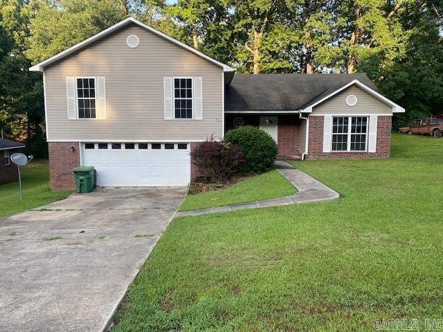 3 Bedroom 2 bath home in Redfield, Arkansas. Recently updated with new flooring, paint and ceiling fans. Large heated and cooled bonus room which could be used as a playroom or fourth bedroom. Beautiful gas fireplace with custom mantel. Large 2 car garage. This spacious home is within walking distance of Hardin Elementary school which is part of the White Hall School District. Also within walking distance is Redfield City Park with baseball fields and lakes for your enjoyment. Conveniently located with only a 20 minute drive to Little Rock or Pine Bluff. Rural Development qualified. This house is move in ready!!!
