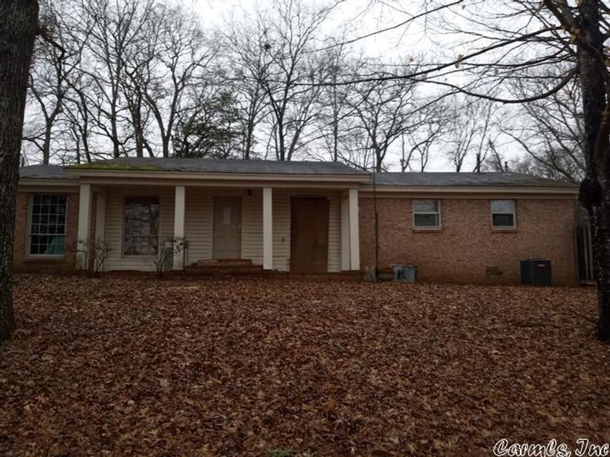 Fixer upper with beautiful wooded lot.  2 bed, 2 bath near intersection of Hwy 9 and Hwy 65.  Earnest money will be expected with any accepted offer and proof of funds will be required before any offer can be submitted.  Property is not eligible for typical FHA, VA or RD financing due to missing fixtures in one bathroom.