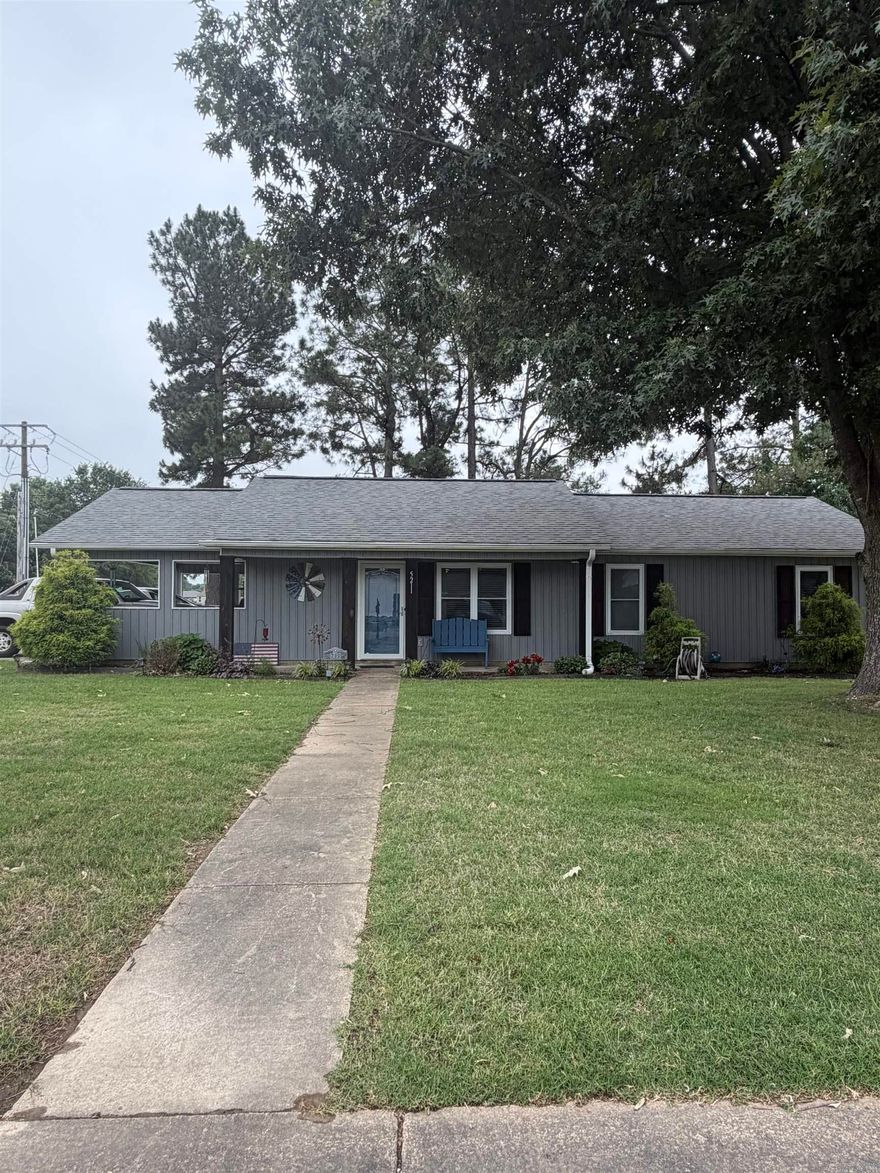 Welcome to this beautifully remodeled gem in Jonesboro! Nestled on a corner lot, this home offers a spacious open floor plan with modern updates throughout. Fully renovated just 6 years ago, enjoy a new roof and HVAC, windows, and stylish flooring. The kitchen is a dream with custom cabinets, new appliances, and a center island that stays. Plus, a luxurious custom tile shower and an added 60 sp. ft. of living space. Outside, the cypress wood columns promised lasting charm, and a storage building in the back offers even more convenience.