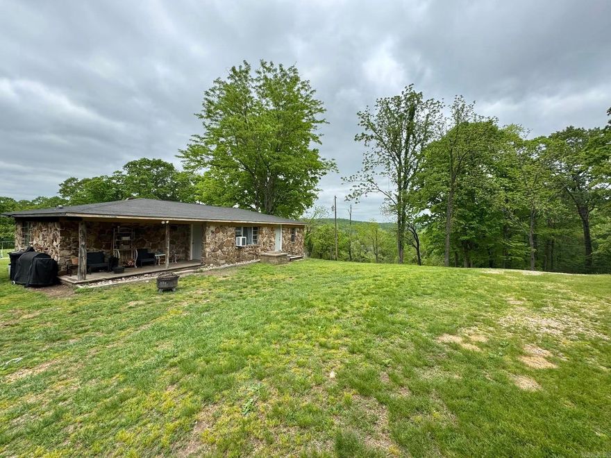 130 acres m/l, house, shop, hunting, pastureland, views, cave, Roasting Ear Creek!   Welcome to your Ozark escape! Situated on 130 secluded acres near Mountain View, this property offers a 1,145 sq ft open-concept home with 2 bedrooms and 1 bath — designed for simple, comfortable living. A 50x40 shop and two additional outbuildings provide excellent storage and workspace. Enjoy approximately 1/4 mile of year-round Roasting Ear Creek, a large cave, hunting opportunities, pastureland, and multiple building sites with breathtaking views. The property borders the National Forest near Fifty-Six, offering endless outdoor recreation. Tucked away from the highway yet just 10 miles from downtown Mountain View and minutes to Blanchard Springs Caverns and the White River. Private, peaceful, and full of potential — a true piece of Arkansas heaven!