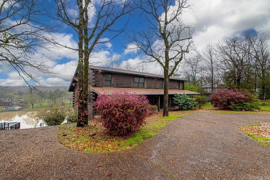 Cozy waterfront cabin with space for all the guests! Each bedroom features an en suite. Currently a highly successful STR and will be sold fully furnished. Excellent location just off the interstate offering amazing views. Plenty of frontage to add a boat dock and a tram.