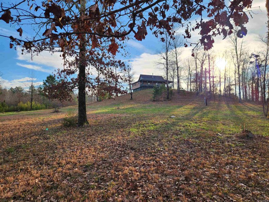 Nestled near Big Fork and bordering the Ouachita National Forest, this secluded cabin is a 30-minute drive from Mena, AR. Boasting 2 bedrooms, 1.5 baths, and a large porch, it offers a perfect blend of comfort and rustic charm. Recent upgrades include a new roof, septic tank, and water heater. Ideal for those seeking tranquility and modern convenience, this cabin is a peaceful retreat in the heart of nature on 5.16 acres with plenty of wildlife. Shown by appointment only, minimum 24 hour notice as it is an operational airbnb.