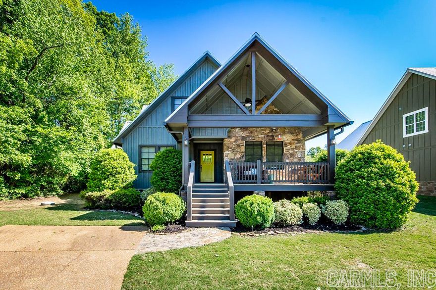 Welcome to your special "getaway" or "live in all the time" custom built home on the peaceful & serene Little Red River! After exiting the charming front porch you'll immediately be drawn to the open living area that features expansive floor to ceiling windows, beautiful wood clad vaulted ceilings, & a wood burning, stone fireplace. Hardwood flooring throughout the home. The kitchen is equipped with granite counters, stainless appliances, and a breakfast bar. Ample space for entertaining that easily flows onto the covered back deck with incredible river views! The home's three bedrooms, two full baths, and laundry room are all on the main floor. The primary suite features a vaulted ceiling and en-suite with jacuzzi tub and walk in shower. The spacious loft, off the main living area, is currently set up as a non-conforming fourth bedroom. Exterior of the home features gorgeous stone/wood construction & metal roof.  HVAC May 2023. New roof, exterior paint, and gutters in 2022. Dock built in 2021 & fiber optic installed in 2022. Neighborhood amenities included gated entrance, pool, pavilion, walking trails, pond. Fully furnished excluding a few items.