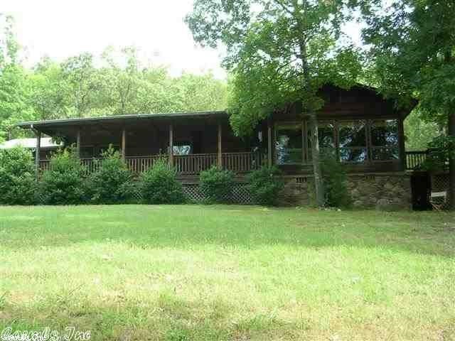 Charming home and beautiful property! Plenty of room to relax inside and out! Enjoy the big front porch while relaxing or stay inside and admire nature at her best with large windows throughout. Open floor plan with an eat-in-kitchen along with a bar to entertain. The living area has a woodburning fireplace, wet bar and gorgeous wood ceilings! Country living at it's best yet only minutes away from shopping, restaurants and freeway. Over 9 acres and lovely home!!!