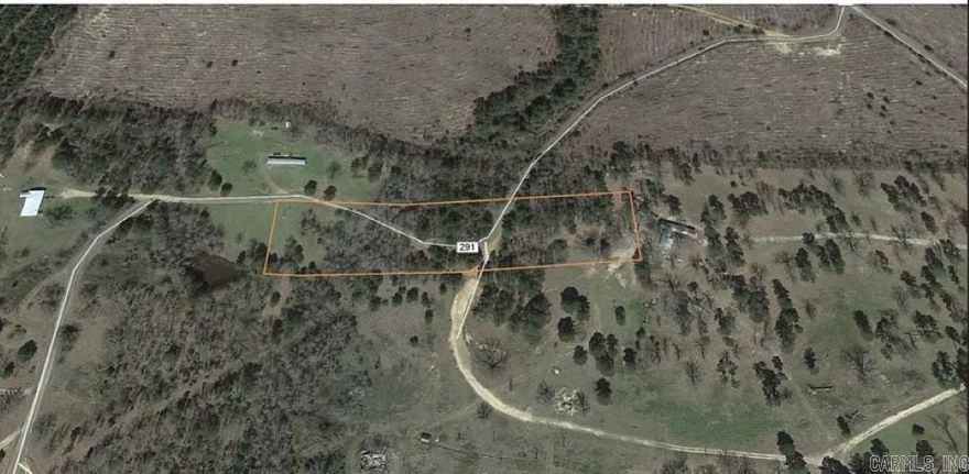 2.78 acre wooded homesite with paved road access through the property. Lot is off of Route 82 and is 15 minutes from amenities of Texarkana.