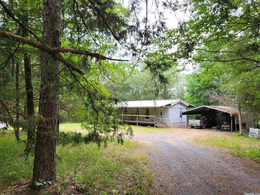 There's no better place to kick back and relax than in this private mobile home. Situated in the peaceful woods of Bonnerdale, this property includes all the conveniences of a traditional residence. With plenty of room for your own personal touches, this house is perfect for when you want to get away from it all. Don't wait- call today for more information!