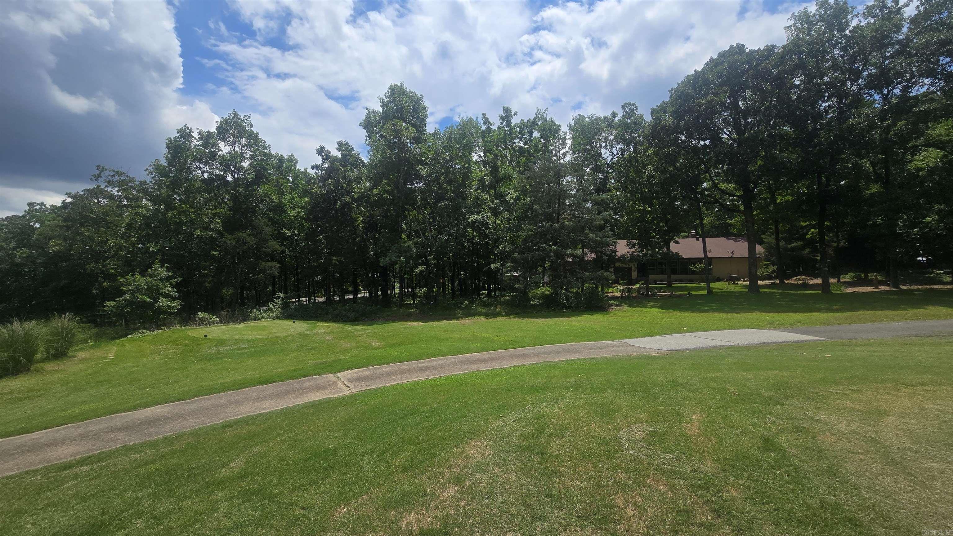 Welcome to your opportunity to own a beautiful 0.37-acre (m/l) corner lot on the golf course in Fairfield Bay, Arkansas, a true slice of paradise! This prime location offers the perfect setting to build your custom home, or weekend getaway and Just minutes from stunning Greers Ferry Lake, it's ideal for those who love fishing, boating, or simply relaxing by the water. Fairfield Bay is packed with amenities, including two 18-hole golf courses, three swimming pools, hiking and biking trails, ATV/UTV paths, tennis and pickleball courts, bowling ally, mini golf, and a full-service marina. Whether youāre seeking outdoor adventure or laid-back leisure, this vibrant community has something for everyone. Donāt miss your chance to enjoy life on the course and near the lake in one of Arkansasās most scenic and active communities.