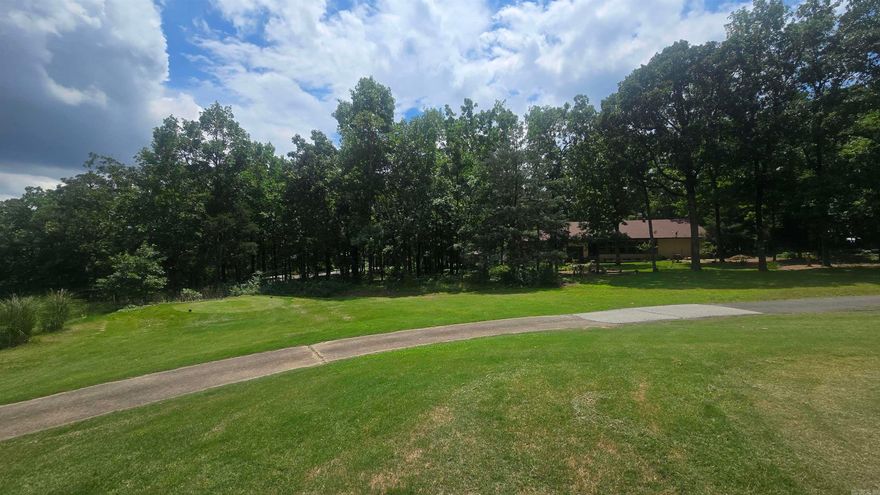 Welcome to your opportunity to own a beautiful 0.37-acre (m/l) corner lot on the golf course in Fairfield Bay, Arkansas, a true slice of paradise! This prime location offers the perfect setting to build your custom home, or weekend getaway and Just minutes from stunning Greers Ferry Lake, it's ideal for those who love fishing, boating, or simply relaxing by the water. Fairfield Bay is packed with amenities, including two 18-hole golf courses, three swimming pools, hiking and biking trails, ATV/UTV paths, tennis and pickleball courts, bowling ally, mini golf, and a full-service marina. Whether you’re seeking outdoor adventure or laid-back leisure, this vibrant community has something for everyone. Don’t miss your chance to enjoy life on the course and near the lake in one of Arkansas’s most scenic and active communities.