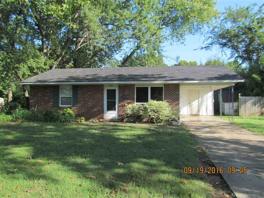 Well maintained 2 bedroom home, laminate & tile floors throughout, all kitchen appliances including refrigerator, spacious bedrooms, 1 car carport, attached storage room with laundry hook-ups, detached storage building.