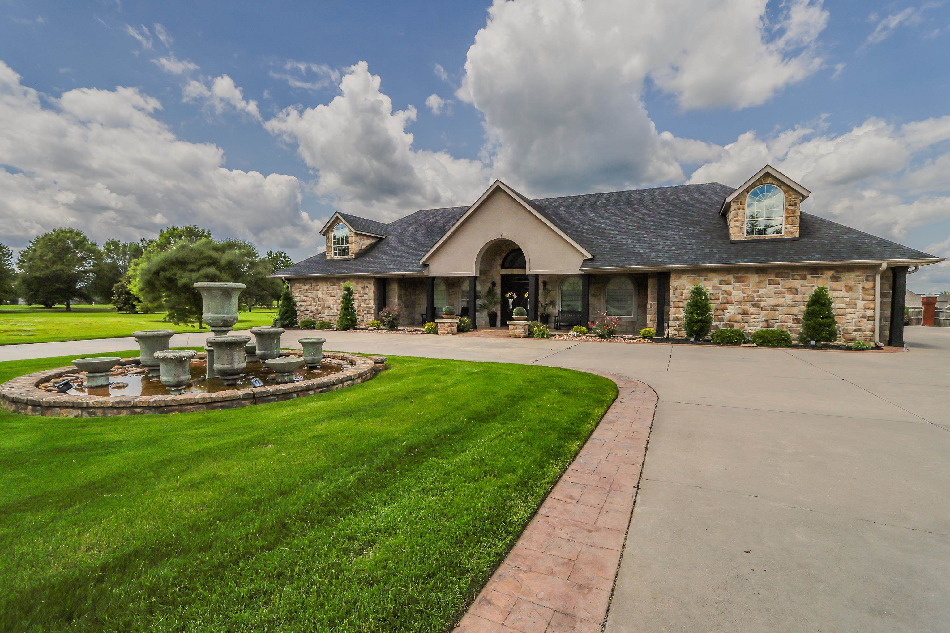 Don't miss this incredible opportunity to own a truly unique property! The main house boasts 3 bedrooms, 3.5 baths, and an expansive open living area designed for both comfort and entertaining. Step inside to a stunning fireplace and fountain wall in the entry, leading to a formal dining room with a wet bar, ice maker, and beverage center. The luxurious primary suite features a spa-like bathroom with a walk-in shower, air tub, and a spacious walk-in closet complete with built-in dressers and a jewelry center. Upstairs, you'll find a bonus room/bedroom with a full bath, closet, and generous attic storage. The chef's kitchen is a dream with a radius island, large pantry, and an open flow to the living area. The 3-car garage offers ample storage, and the laundry room is simply amazing! The attached 1-bedroom, 1-bath apartment is completely newperfect for guests, older kids, or multigenerational living. Enjoy modern updates throughout and a stealth pool for ultimate relaxation. Move-in ready and waiting for you!