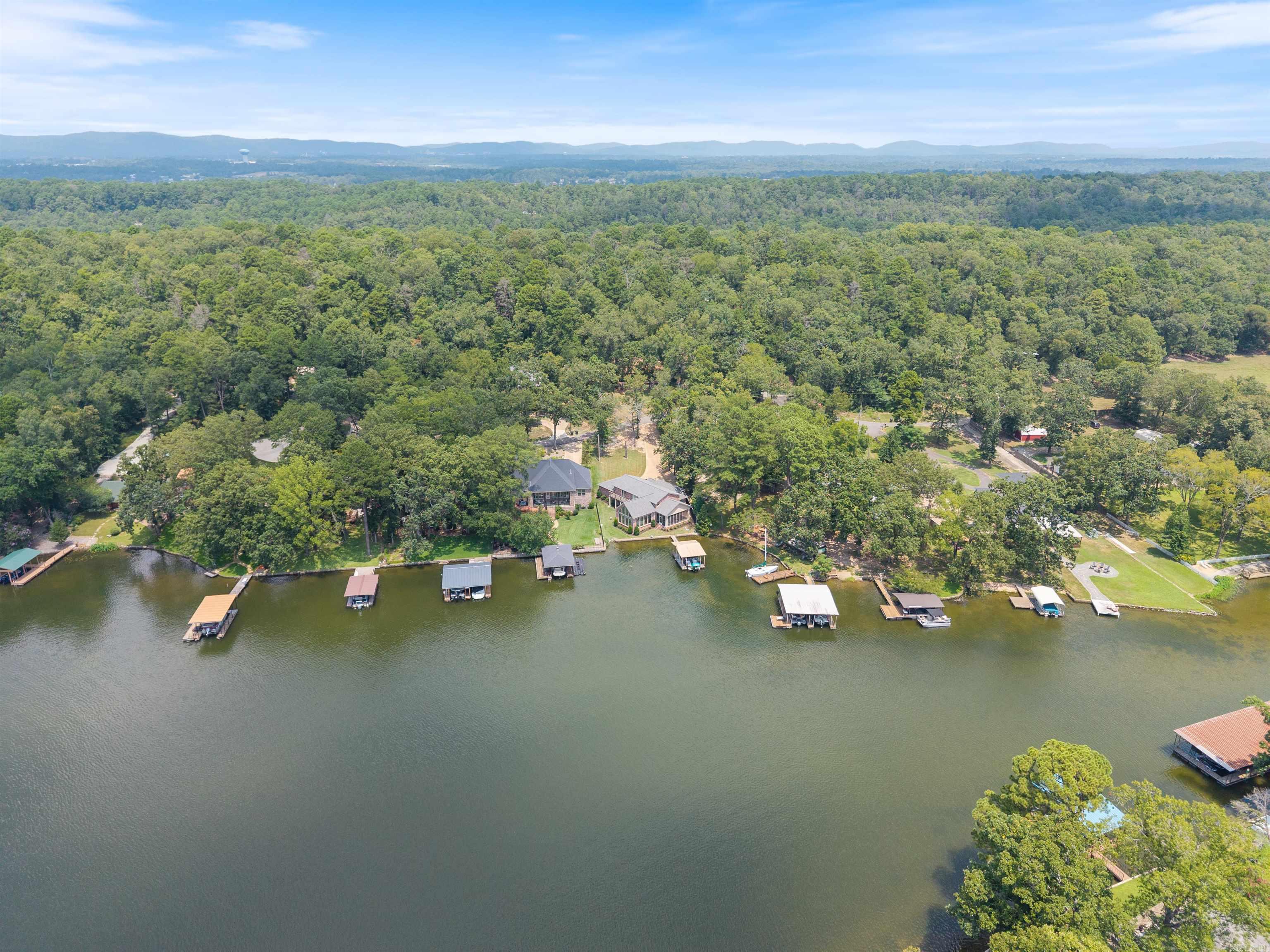 Beautiful lake lot in a private cove on Lake Hamilton. Agents see remarks.