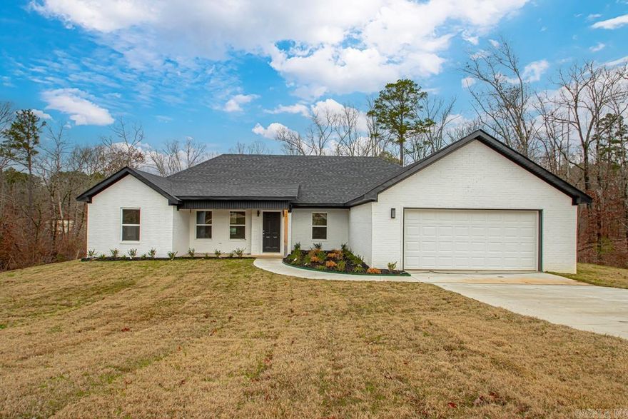 **Sod has been laid! Updated pictures coming!** Beautiful brand-new construction on 3.27 acres, just minutes from Highway 70. This all-brick home offers 3 bedrooms, 2 bathrooms, a desirable split floor plan, and vaulted ceilings in the living room. The spacious kitchen features stainless steel appliances, a stainless apron-front sink, and plenty of room for cooking and gathering. Enjoy peaceful country living with a covered back porch, perfect for relaxing or entertaining.