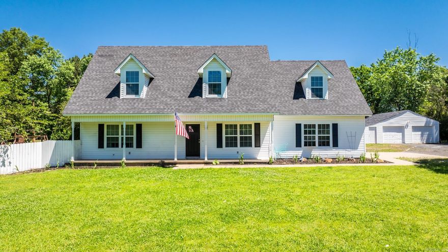 Completely Renovated Home on 2.58 Acres with In-Ground Pool & Detached Garage/Shop! This beautifully updated home offers space,style & functionality both inside & out! Tucked behind a tree-lined drive,the home features a low-maintenance exterior,large front porch & bonus/retail/garage space—ideal for a home business or studio.Inside,enjoy wide plank wood-style laminate floors,updated lighting & modern finishes throughout.The main floor hosts a spacious living room,open dining/kitchen combo w/granite countertops, stainless Samsung appliances,sunroom/den,laundry & luxurious master suite w/private courtyard w/deck & access to pool.Master bath has newly remodeled bath & walk-in shower.Upstairs, find 3 bedrooms, a bonus/4th bedroom & updated hall bath w/tile-lined tub/shower.All bedrooms feature new carpet,built-ins, & window bench seating w/storage.Step outside to a private backyard oasis: multi-level wood decking,hot tub, fenced yard,storm shelter & a 40’ x 20’ L-shaped in-ground pool w/newer liner and pump. A 32’ x 30’ detached 2-car garage/shop & 23’ x 23’ metal building provide ample storage and workspace.This move-in ready retreat combines comfort,versatility & charm-don’t miss it