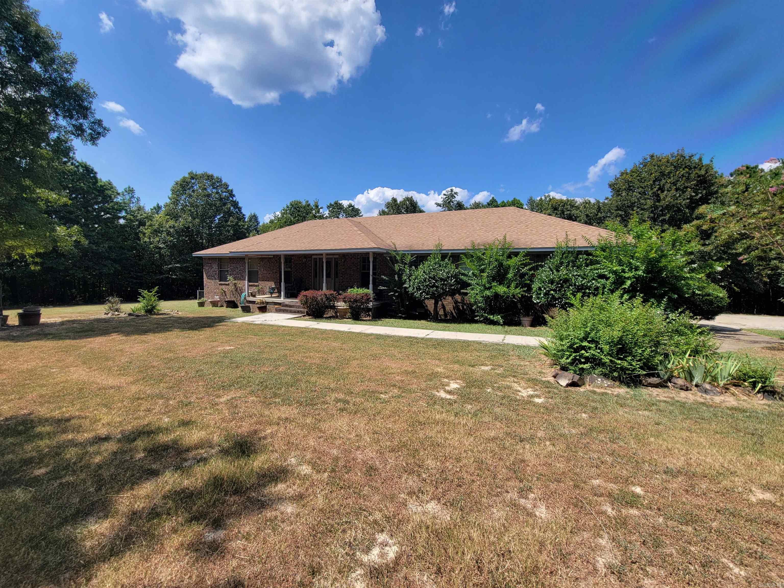 Escape to your own little hobby farm - just 30 minutes from both Little Rock and Conway! This charming home offers the perfect blend of peaceful rural living and easy city access. The roof is only 5 years old, giving peace of mind for years to come. Inside, you'll find a flexible floor plan that includes a formal living and dining room, an eat-in kitchen, and a cozy den that opens out onto a large back deck - perfect for relaxing or entertaining under the open sky. The spacious primary suite features a double vanity, walk-in closet, and private toilet room, along with its own access to the back deck. Bedrooms 2 and 3 share a full bath, and thereās an extra guest bathroom for added convenience. Outside, a separate shed/shop with windows offers the perfect spot for storage, hobbies, or even a little workshop. Whether youāre dreaming of gardening, raising animals, or simply enjoying some elbow room - this property is ready to make it happen!