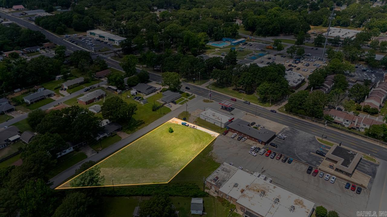 LOCATION! LOCATION! LOCATION! This multi family lot is right in the heart of Sherwood. Across the street from Sherwood Municipal Complex and also just minutes from the interstate. Lot is cleared and ready to be build on. Currently zoned R2. Utilities are available. Exceptional piece of property for investor or developer! (1 of 3 package parcels) *See agent remarks!