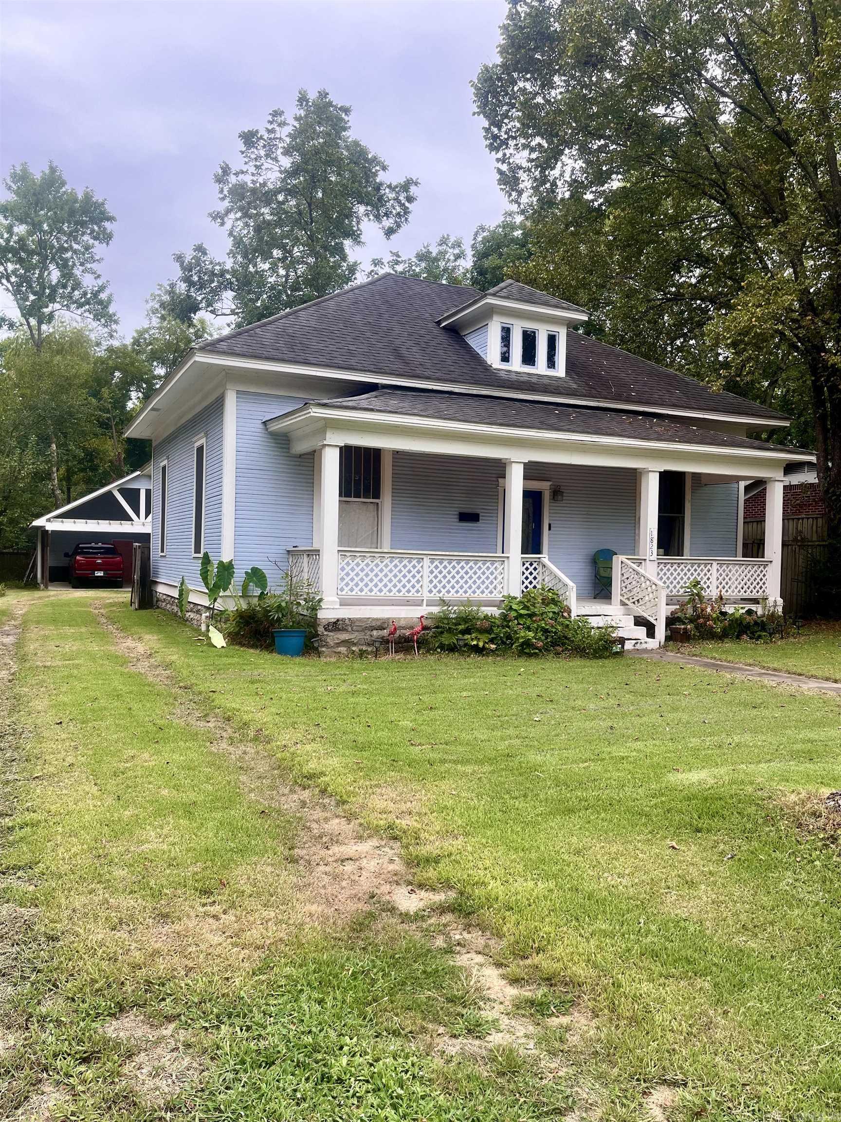 One of the FABULOUS finds in Old Town Conway! This house was taken down to the studs and rebuilt from the inside in 2013 by the previous owner. 12' ceilings, 10' ceilings in bathrooms & kitchen, repurposed wood floors were taken from the original walls & ceilings. The wood floors are throughout except for kitchen & bathrooms have tile. Original doors & trim were used when possible. Quartz countertops, custom cabinets, soaking tub, huge shower, all electric. Fenced yard, raised garden beds, small rock fireplace in back yard.Carport has storage and electric. Spray foam insulation was applied before sheetrock making this very energy efficient. Island, Washer/Dryer & Refrigerator convey. One of the Jewels of Old Town Conway! Please wear soft soled shoes when viewing to preserve floors. *****No showings until Monday, Sept. 1. Get your showing booked now!
