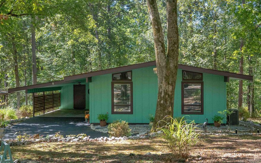 Investor opportunity or First Time home owner.  Don't delay in checking out this adorable home in great condition located north of Lake DeSoto in a great area of HSV.  Convenient to shopping, gas station and West Gate.  This gem is set up for a vacation rental and with acceptable offer could convey fully furnished.  Luxury Vinyl plank flooring.  New plumbing throughout in 2020.  Roof in 2019.  Outside HVAC unit in 2019. Gas log fireplace. Large wood deck new in 2020 is 6' x 28'.  Covered carport is 16' x 25'.  Outside storage under carport is 6' x 12'.  HSV has a $2000 New Member fee and a $150 transfer fee collected from Buyer @ closing.