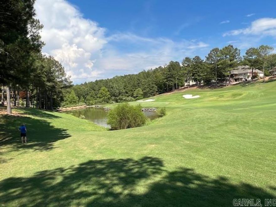 Build your dream home on these TWO Beautiful Conjoined Granada Golf course Lots Located in Hot Springs Village! Close proximity to Isabella, Ponce de Leon and Magellan Golf courses, East Gate & Balboa Gate Exits for quick access to Hwy 5 or 7!  Balboa Lake & Marina, Coronado Fitness Center, Tennis & Pickleball Courts, are minutes away too!  Community: Located in the nation's largest gated community featuring 11 lakes, 9 championship golf courses, mile after mile of nature trails, two outdoor court complexes, and fitness center. Golf, fish, hike, boat, or just sit surrounded by nature!