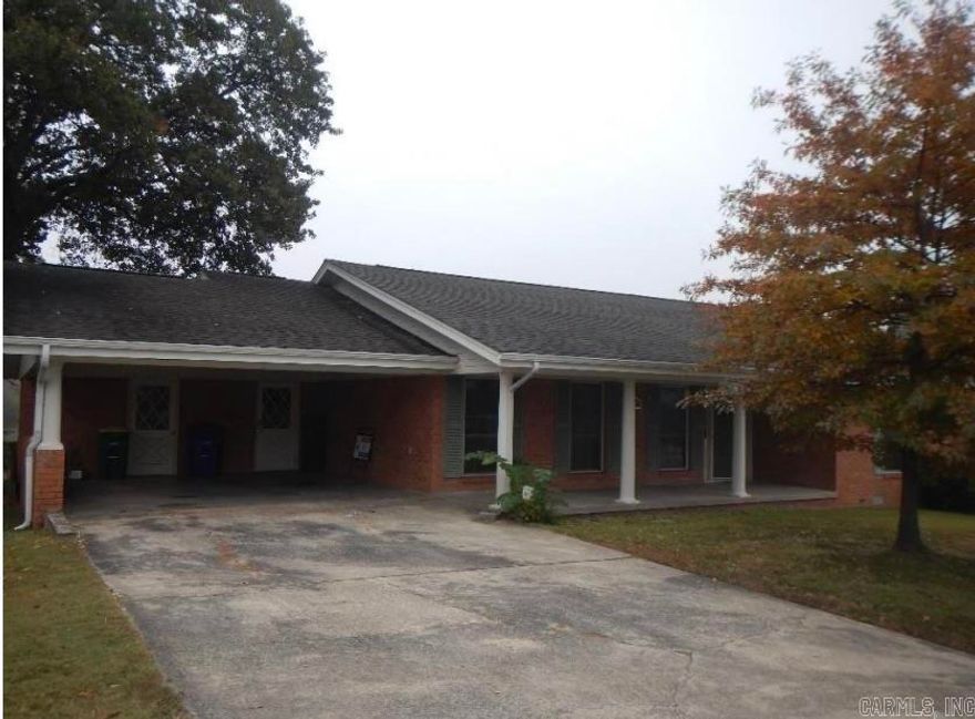 Older home needing lots of updates but in good condition baths are original with beautiful purple and green tile some wood floors Living room in front wit denim back .Good size bedrooms plus level lot with nice deck .