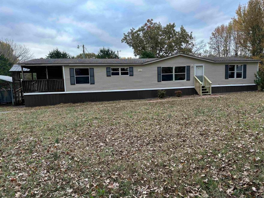 Country Setting w/0.98 Acre! Move-in ready! Spacious living room, 4 Bedrooms, 2BA & open floor plan.  New HVAC Units, new electric water heater and both bathrooms have tub/shower combo, primary bedroom has 2 WI Closets, fresh interior paint throughout the house, painted cabinets, doors & trims.  Kitchen offers SS kitchen Appliances, light fixtures,  new carpet in bedrooms & remainder flooring has luxury vinyl flooring, Septic Tank has been pumped & repaired, Kitchen offers Formica countertops &  large laundry room w/ mud sink & plenty of parking space & see carport awning leads to large-covered side porch deck, new front porch & back porch steps & Permanent foundation. This home is waiting for new family!  Agents see Remarks!