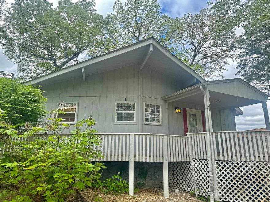 Newly listed 1,176 sq/ft., 2 bedroom, 1 full and 1 three-quarter bath home. Features include hardwood, carpet, and ceramic tile flooring, knotty pine ceilings, fireplace with insert, 2-car garage with ample storage space, front and back decking and dedicated screened-in deck that's perfect for entertaining throughout the seasons. It features central air and central propane gas heat. The property is beautifully landscaped with views of the golf course and river, but has a secluded feel. Lots of updates, including the roof shingles in 2021. All appliances included, with the dishwasher, washer and dryer being new in 2024. The septic system was also newly installed in 2024. This property is sure to make you feel right at home.