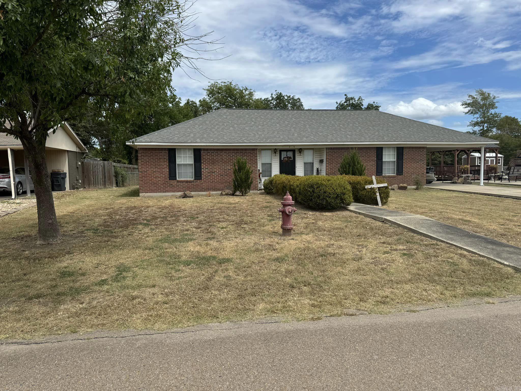 Are you looking for a new home? Check out this brick home located in the city of Lake Village! This property features a split floor plan, three bedrooms, two bathrooms, living room with fireplace, large fenced in yard, outdoor fireplace and swimming pool! Call (870)265-5664 for more details!