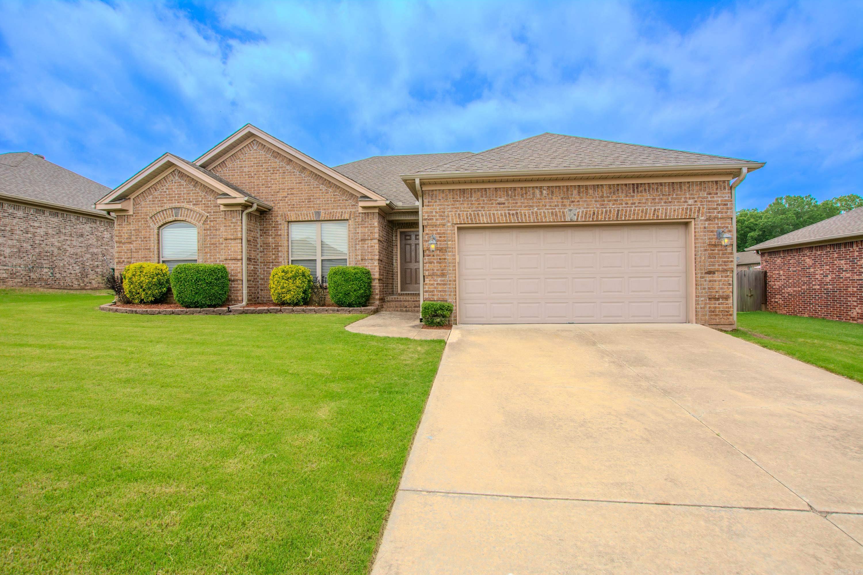 Discover this beautifully maintained 3-bedroom, 2-bathroom brick home in the tranquil Cross Creek neighborhood. Featuring a spacious great room with luxury vinyl plank flooring throughout, this home offers a split floor plan for added privacy. The kitchen boasts freshly painted cabinets, a new dishwasher, and a new microwave. The primary suite includes an en-suite bathroom with double sinks, a separate shower and tub, and a large walk-in closet. Enjoy outdoor living in the fully fenced backyard with a covered patio. Conveniently located near the interstate, this home offers easy access to surrounding areas. Don't miss the opportunity to make this charming home your own. Schedule a tour today!