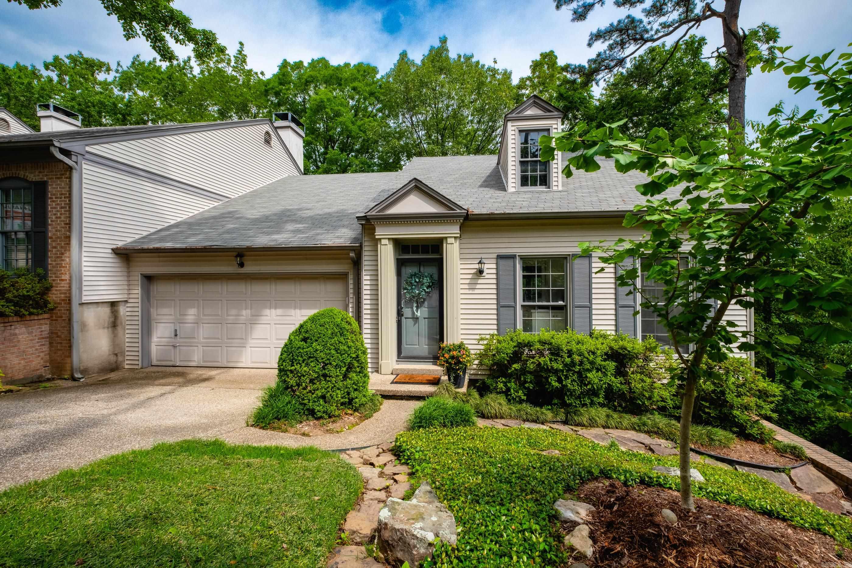 Fully Renovated Townhome in the Heart of Historic Hillcrest! Located in one of Little Rock’s most sought-after neighborhoods, this beautifully updated townhome offers modern finishes. Step inside to discover an open and inviting layout with vaulted ceilings, refinished real hardwood floors, and abundant natural light. The eat-in kitchen has been completely reimagined with quartz countertops, tile backsplash, new cabinetry, an island with cooktop, updated hardware, lighting, and appliances—perfect for entertaining. The primary suite is conveniently located on the main level, tucked away for privacy. It boasts a large walk-in closet and a luxurious ensuite bath with double vanities, quartz countertops, walk-in shower, soaking tub, and updated fixtures and tile flooring. The main level also includes a formal dining area, stunning half bath, utility room, and walk-in pantry. Downstairs features two additional bedrooms and a newly renovated full guest bath. Other upgrades include a new hot water heater, improved insulation, a cozy wood-burning fireplace, built-ins, and a spacious 2-car garage. This one checks all the boxes—style, location, and functionality! COME SEE!