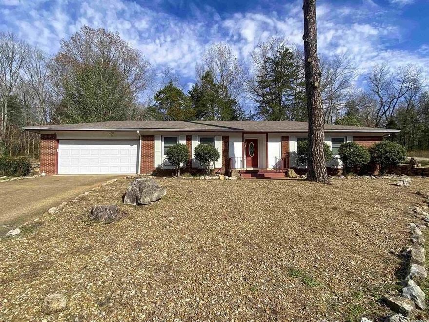 Brick home on two level lots.  Nice 3 bedroom, 2 bath family home. With garage and enclosed sun porch.