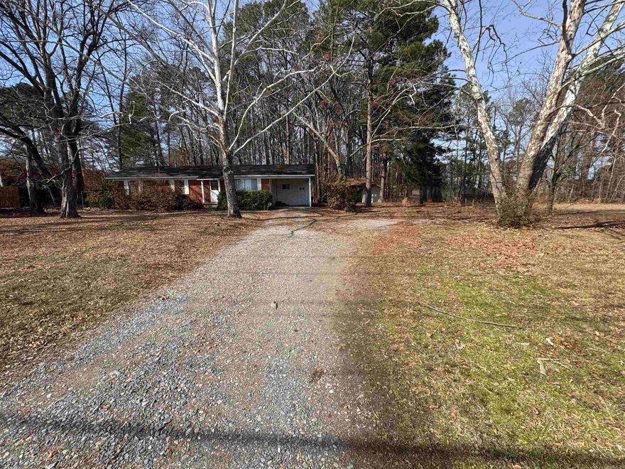 Virtually a blank slate ready for your development! This is a fantastic approx 3.73 acres w/approx 430' of road frontage on Vimy Ridge Rd. The deepest measurement is approx 730' deep w/least being approx 270' deep & average depth of property is approx 480' deep. This is 2 parcels being sold together. This road frontage property has a Shell Gas station to its South, a mid-sized company to its North and a mid-sized company across the road. This could be an ideal location for a sit-down restaurant, fast food dining such as Sonic, Dairy Queen or Other, a Hotel, a Plumbing, an Electrical or Other Businesses too. Many options are on the table for the future owner to transform this property into.  This property is approx 1/2 a mile from I-30 and Amazon too. The home structure on the property conveys at no value. Professional photos and videos to follow shortly in mid March. See Agent Remarks.