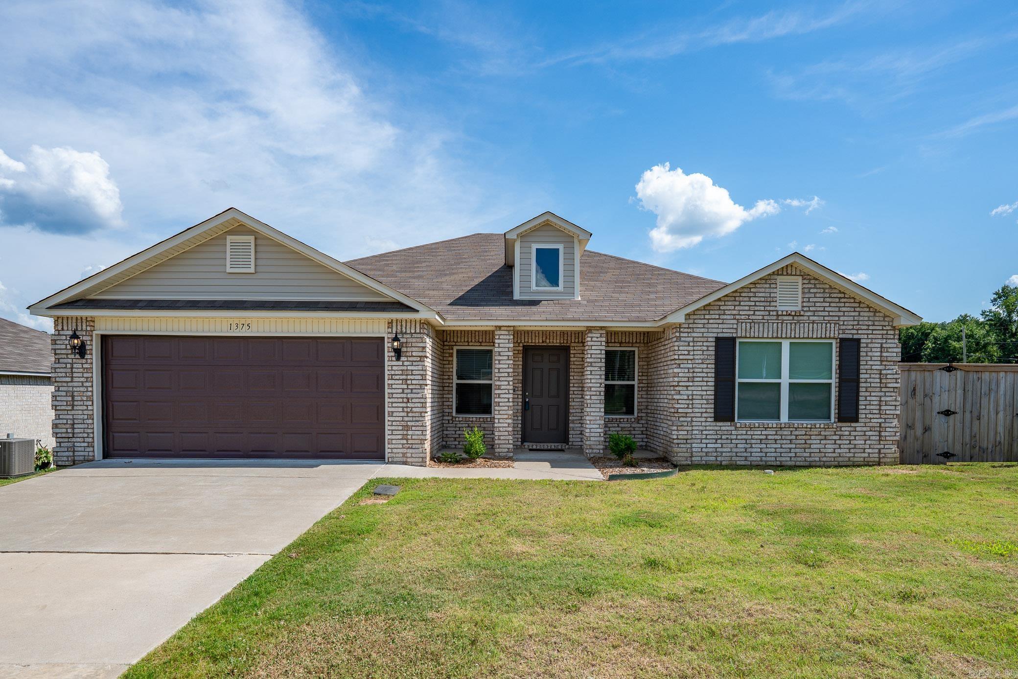 Welcome to this move in ready, all-brick home situated on a desirable corner lot within Conway city limits! This beautifully maintained property features a spacious, fully fenced backyard with a full-size gateāperfect for outdoor entertaining or family fun. Inside, youāll find luxury vinyl flooring throughout and a bright, open floor plan with ceiling fans in every room for added comfort. The spacious eat-in kitchen is a chefās dream with a large island, extended patio access, and upgraded finishes. Enjoy modern conveniences like a Ring alarm system, upgraded shower heads in both bathrooms, and a structural warranty that transfers to the new buyer for added peace of mind. Donāt miss the opportunity to make this move-in ready gem your new home!